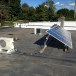 ACDC12 Outdoor Condenser Units with 6 Flat Roof Mounted Solar PV Panels