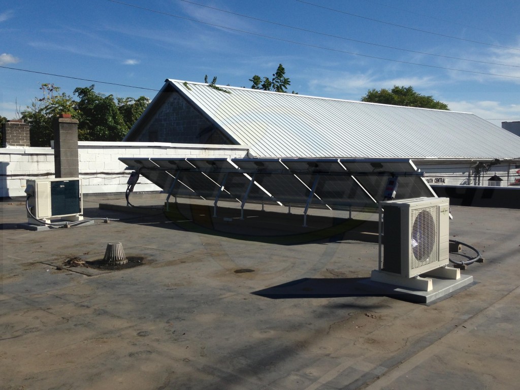 ACDC12 Outdoor Condenser Units with 6 Flat Roof Mounted Solar PV Panels