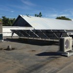 ACDC12 Outdoor Condenser Units with 6 Flat Roof Mounted Solar PV Panels